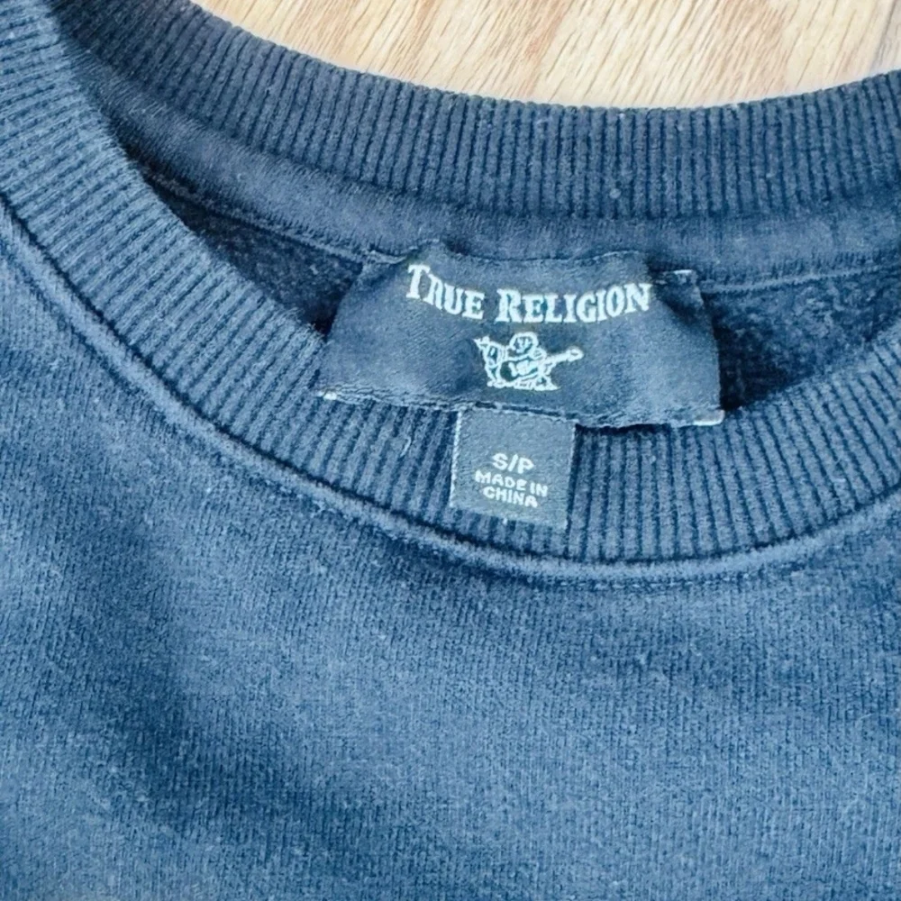 Black Sweater with Gold Logo